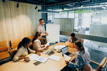 Modern office setting focused on effective project task distribution © Kostiantyn