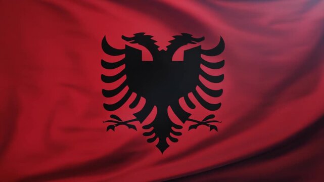 "Albania flag with red background and black double-headed eagle, symbolizing bravery, sovereignty, and unity."