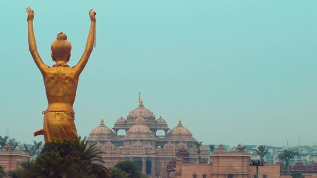 Beautiful cinematic view of Akshardham temple in Delhi featuring the peaceful Swaminarayan meditation statue and grand architecture.