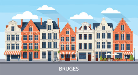 Naklejka premium Picturesque row of traditional Belgian architecture townhouses in Bruges set against a bright blue sky with clouds.