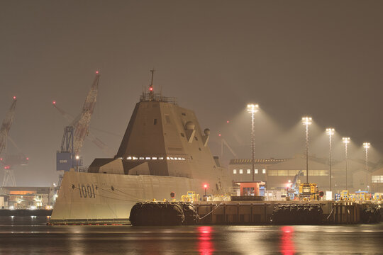 United States Navy USS Michael Monsoor (DDG-1001), Zumwalt-class guided-missile destroyer moored at Yokosuka Port, Tokyo, Japan at night