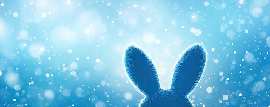 Dreamy blue bunny ears in a sparkling light-filled winter wonderland background