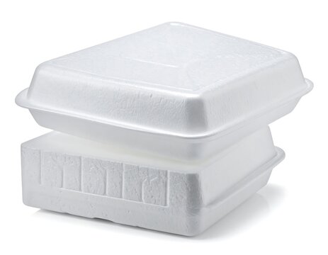 Two white, rectangular food containers, one stacked atop the other, showing a textured exterior and a hinged lid