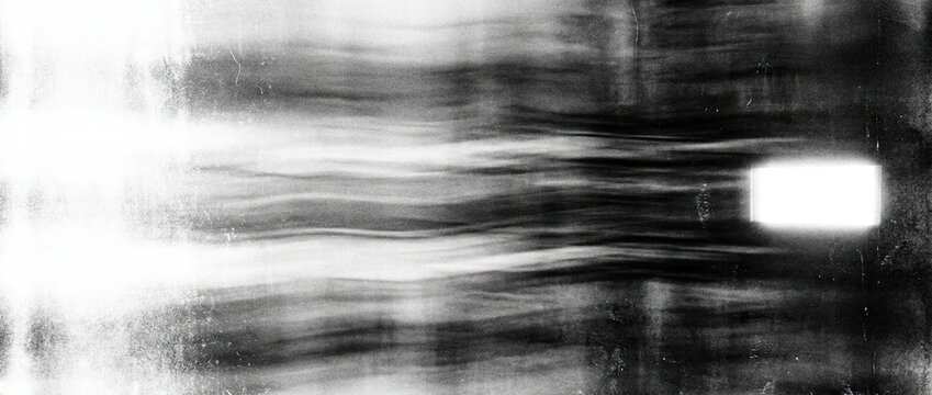 Abstract black and white motion blur background with light streaks and dynamic lines