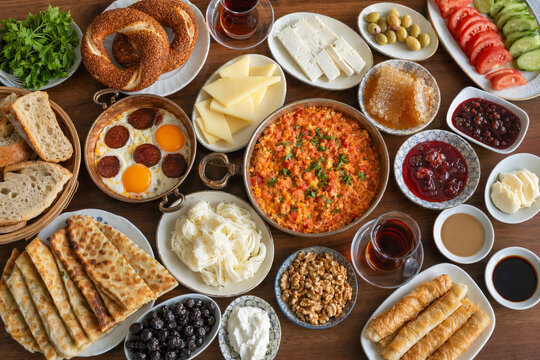 Flat lay traditional Turkish serpme breakfast table featuring a wide variety of authentic Turkish dishes