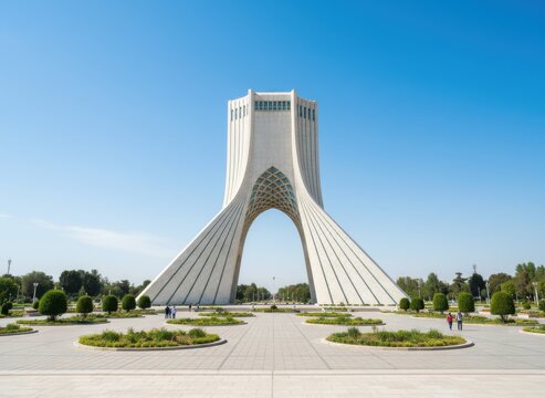 Azadi tower in tehran, iran, with white stone arch and geometric patterns