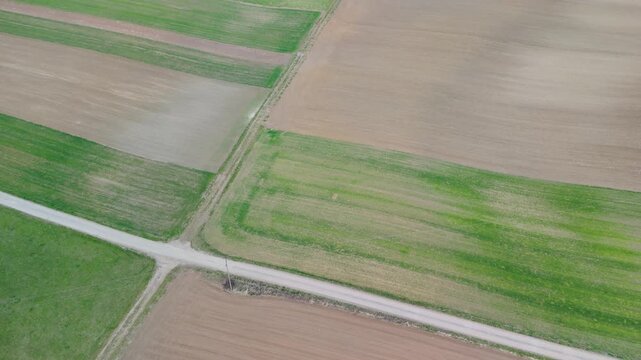 aerial farmland intersection roads for agriculture logistics concept with field boundaries and rural transport network