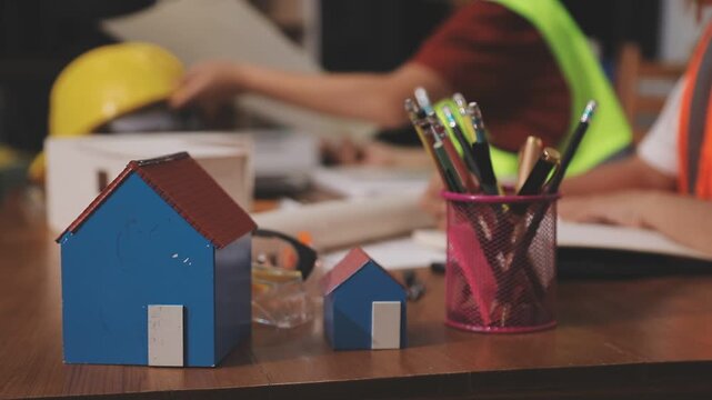 Architecture drawing on architectural project business architecture building construction Colleagues designer Planning Design on blueprint and compasses