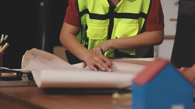 Architecture drawing on architectural project business architecture building construction Colleagues designer Planning Design on blueprint and compasses