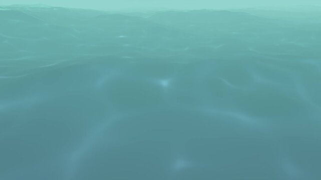 Underwater view of clear blue-green water with sunlight filtering through the surface ripples, creating shimmering light patterns.