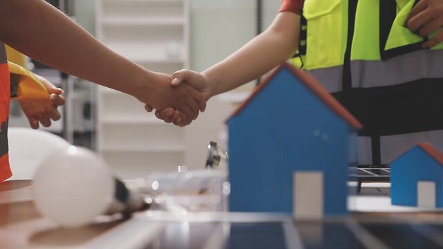 Architecture drawing on architectural project business architecture building construction Colleagues designer Planning Design on blueprint and compasses