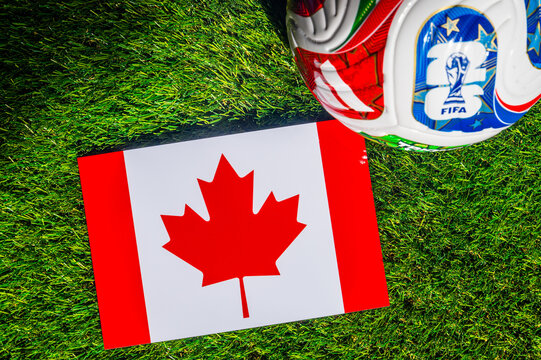 Canada National Flag and Official FIFA 2026 Soccer Ball on Professional Turf
