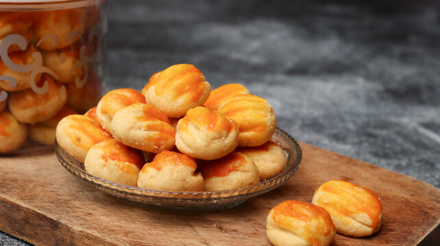 Nastar Cookies, Pineapple tarts or nanas tart are small, bite-size pastries filled or topped with pineapple jam, commonly found when Hari Raya or Eid Al Fitr or Lebaran. Selective focus