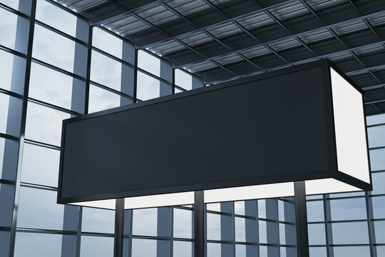 Blank rectangular advertising signage mockup hanging in modern glass airport interior with clean empty space for branding, promotion and design. 3D Rendering