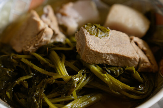 Boiled pork with leafy vegetables as eaten in NE India.