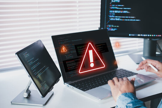 AI system monitoring alert on laptop dashboard with warning signal, anomaly detection in modern workspace, developer observing system health metrics, real time performance issues in SaaS environment