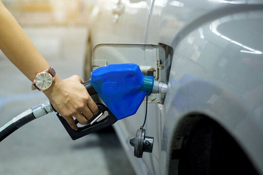 Handle nozzle Fueling your car Gray in gasoline stations.