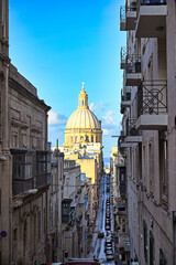 Obraz premium Basilica of Our Lady of Mount Carmel and Old Mint Street in Valletta, Malta