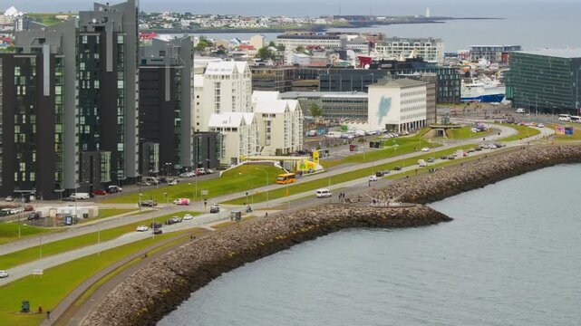 Reykjavik, Iceland. Aerial view of the city center of Reykjavik, Iceland during a cloudy day in summer. Time-lapse with car traffic in downtown