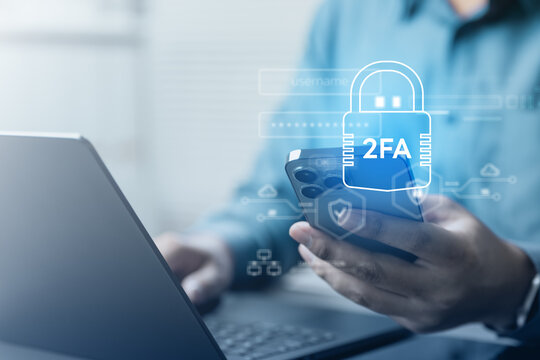 User holding smartphone with 2FA lock interface, illustrating secure login, multi factor authentication, and data protection in digital environment.