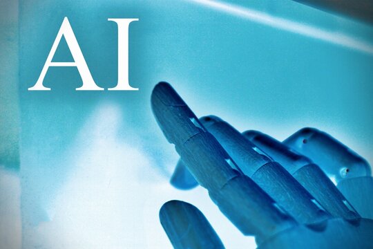 Close-up of a robotic hand with the text "AI", representing artificial intelligence, advanced technology, and digital innovation. Futuristic concept illustrating automation, machine learning, and huma