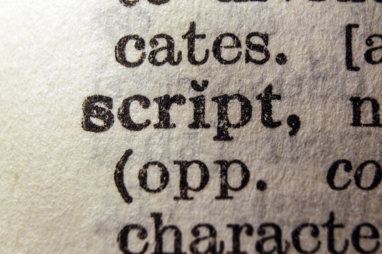 Word script on dictionary page, macro close up
