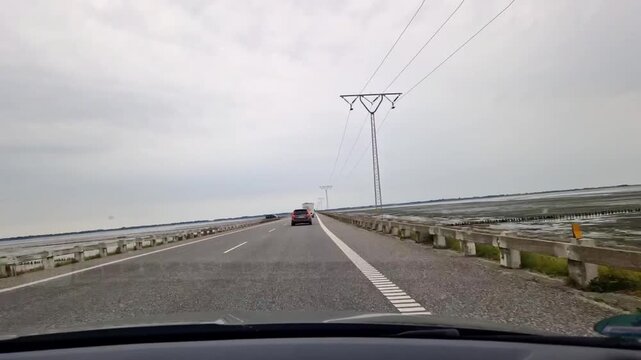 Dashcam Footage Driving on Dike Causeway Across Wadden Sea near Ribe, Denmark