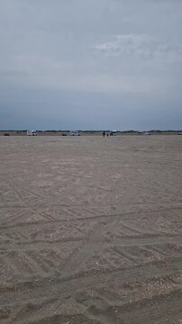 Vast Wadden Sea Tidal Flats near Ribe, Jutland, Denmark Under Cloudy Sky