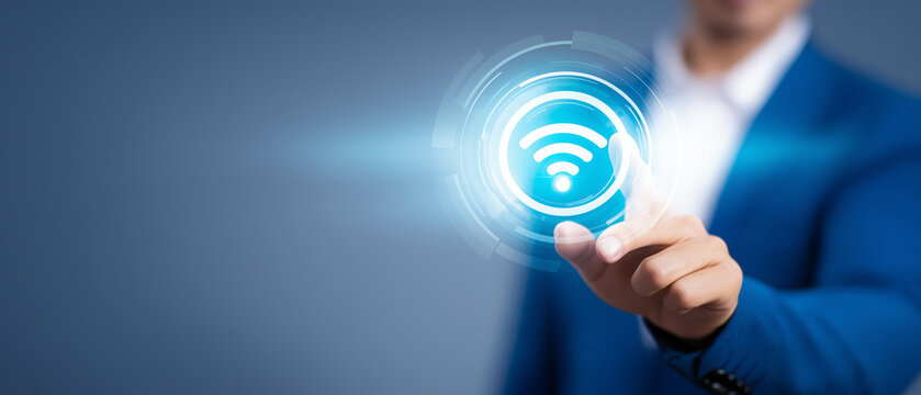 Businessman using virtual telecom interface with wireless signal icon, digital communication and network technology concept, connectivity, data transmission, smart business and fut