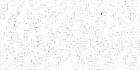 Obraz premium Halftone paper textured background with a modern dotted pattern