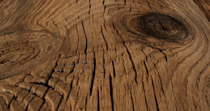 Dramatic Weathered Wood Closeup Revealing Fissures, Shadowed Knothole, Rough