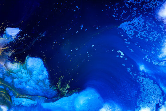 Colors blend in a vibrant depiction of ocean waves and underwater life in a digital abstract art piece
