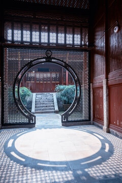 Traditional Chinese Architecture with Circular Moon Gate