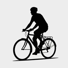 Fototapeta premium Black silhouette of a male cyclist riding a bicycle with a helmet, concept of outdoor sports and eco-friendly transportation