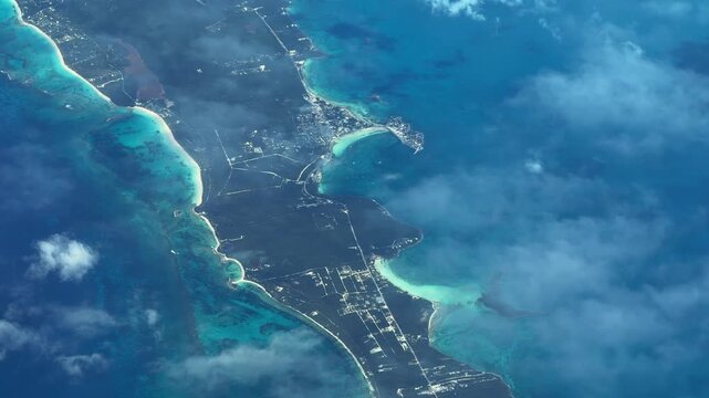4k aerial video footage flying across North Eleuthera, the Bahamas,  near Governor's Harbour with sand beaches, shallow  turquoise water surface and Levy Island, located in the Caribbean Sea 