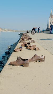 A powerful installation of bronze shoes lines the banks of the Danube River in Budapest, Hungary.