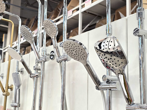 A close-up view of new shower heads on display