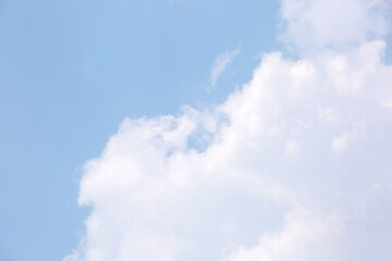 Soft white clouds floating in bright blue sky background © 코끼리 잠자는