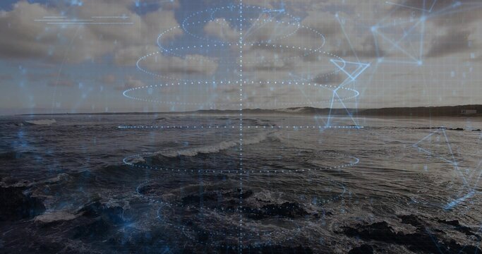Displaying coastal seascape showing churning waves over rocky shoreline with holographic overlay