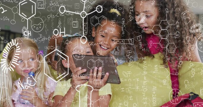 Leaning four girls holding phone and studying science overlay in class, in summer clothes