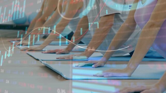 Fitness class on cue pressing, lifting chest on blue mats, faint candle charts overlaying for tone