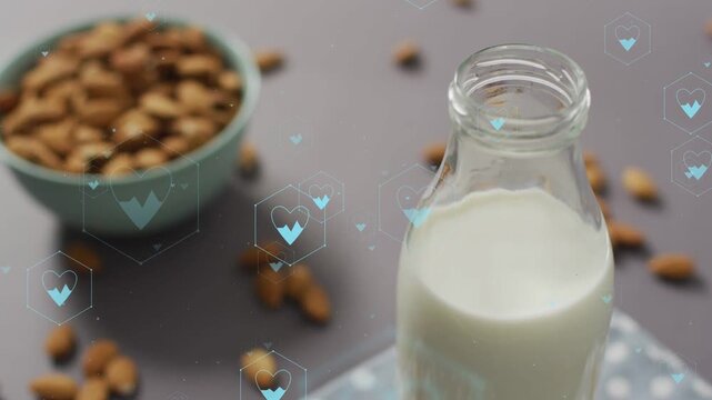 Focus shifting, bottle sharpening and rising while teal hearts drifting and settling, showing focus