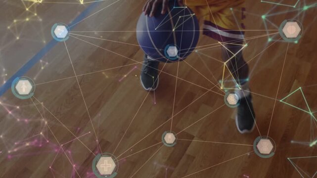 Male teenager pushing blue ball, starting dribble and practicing sports while AR hex grid aligning