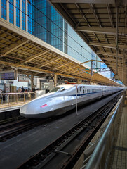 High-Speed Shinkansen Bullet Train at Modern Railway Station Platform © sassn.ro
