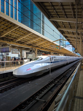 High-Speed Shinkansen Bullet Train at Modern Railway Station Platform