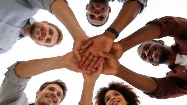 diverse people joining hands in circle
