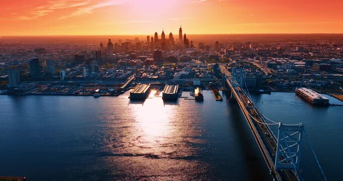 Warm golden light of sunset covers the scenery of Philadelphia, Pennsylvania, USA.