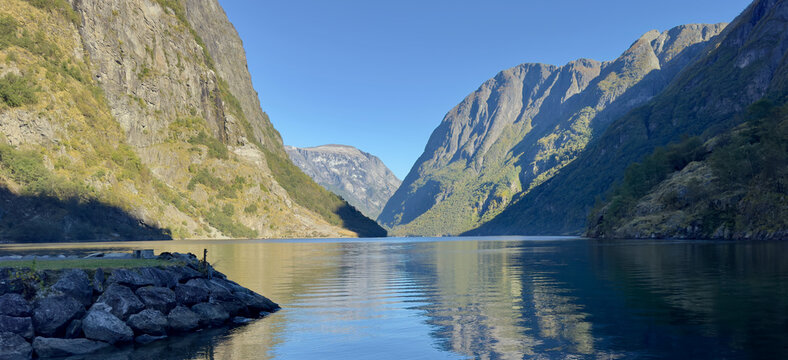 Gudvangen Norway -  a cold, blue and clear autumn day by the fjord