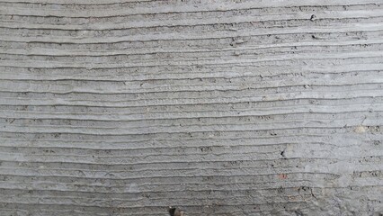 Naklejka premium Rough concrete texture with horizontal grooved lines. floor texture.