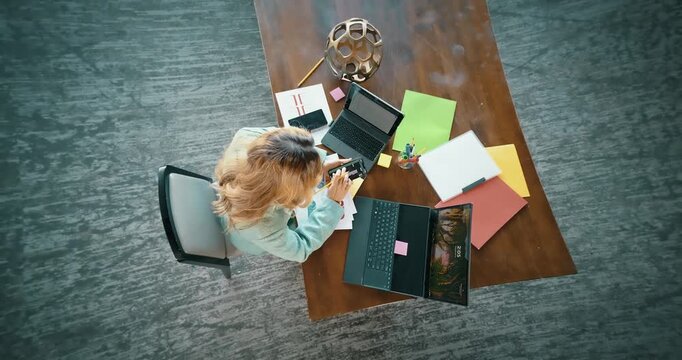 Overhead View of Busy Remote Workstation